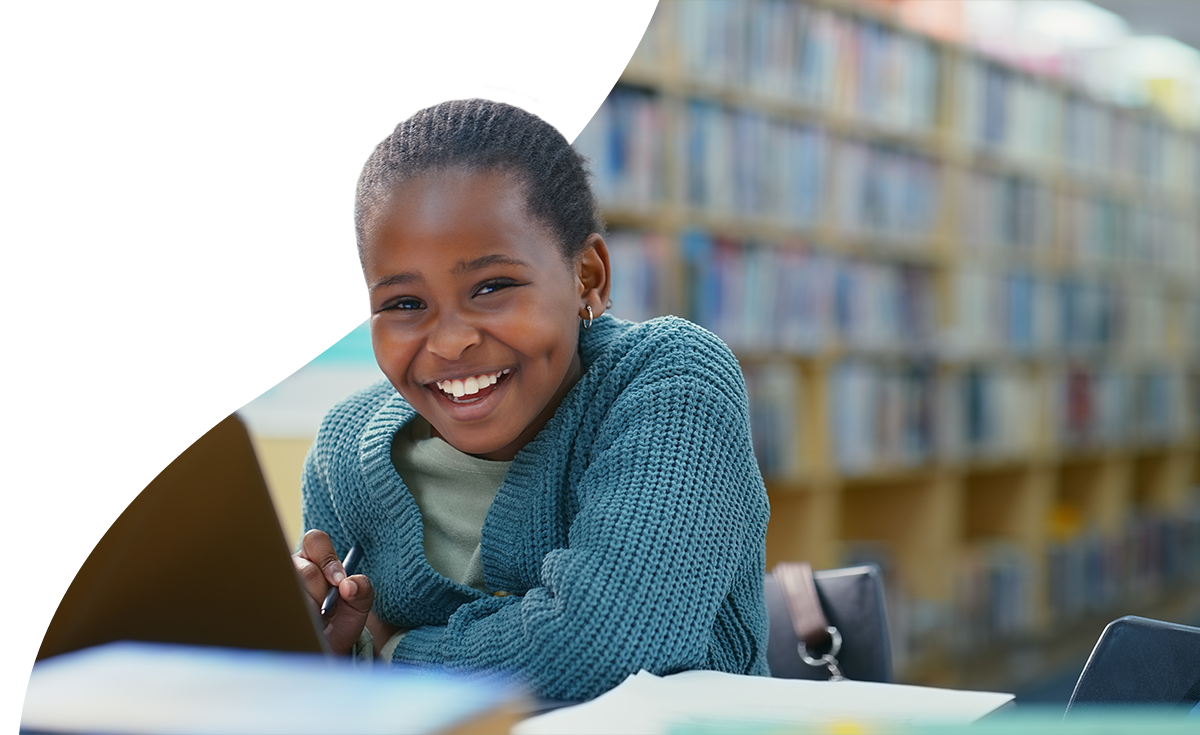 smiling student in library