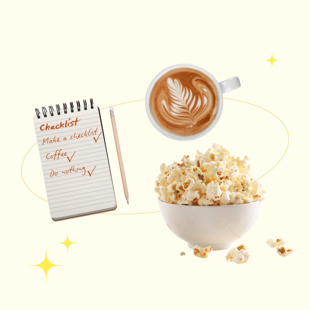 A cup of coffee, two DND dice and a bowl of popcorn
