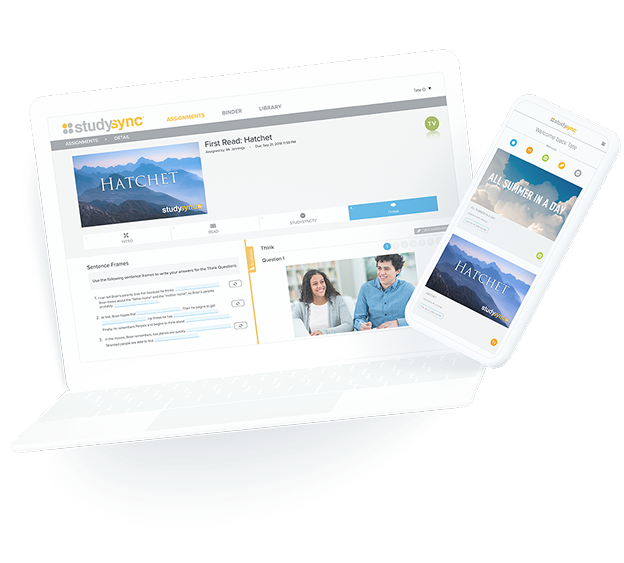 Teacher assisting high school student in class