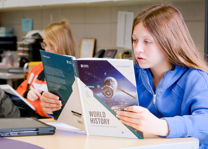 Young student with Traverse print companion.